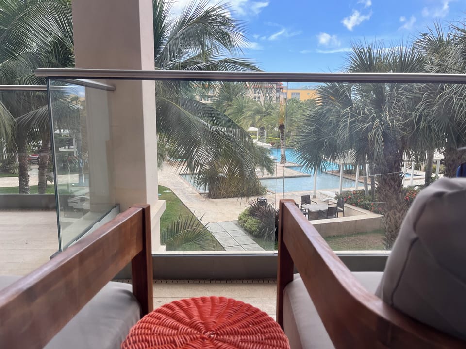 Balcony Views of the pool area and beautiful landscaping