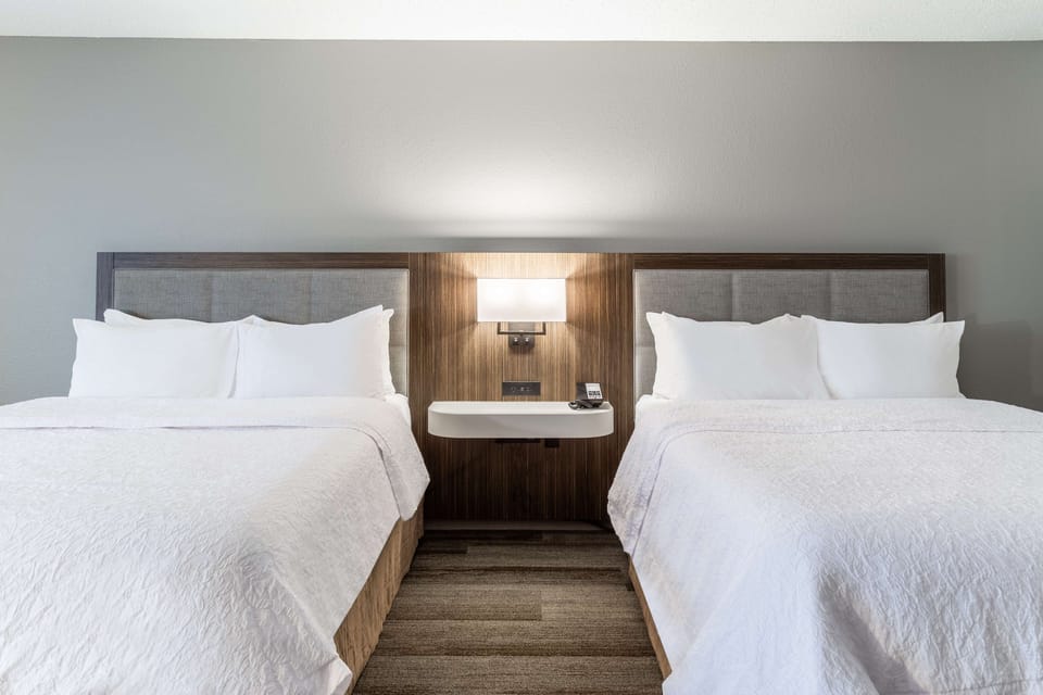 Standard room with two double beds | Individually furnished, desk, laptop workspace, blackout drapes