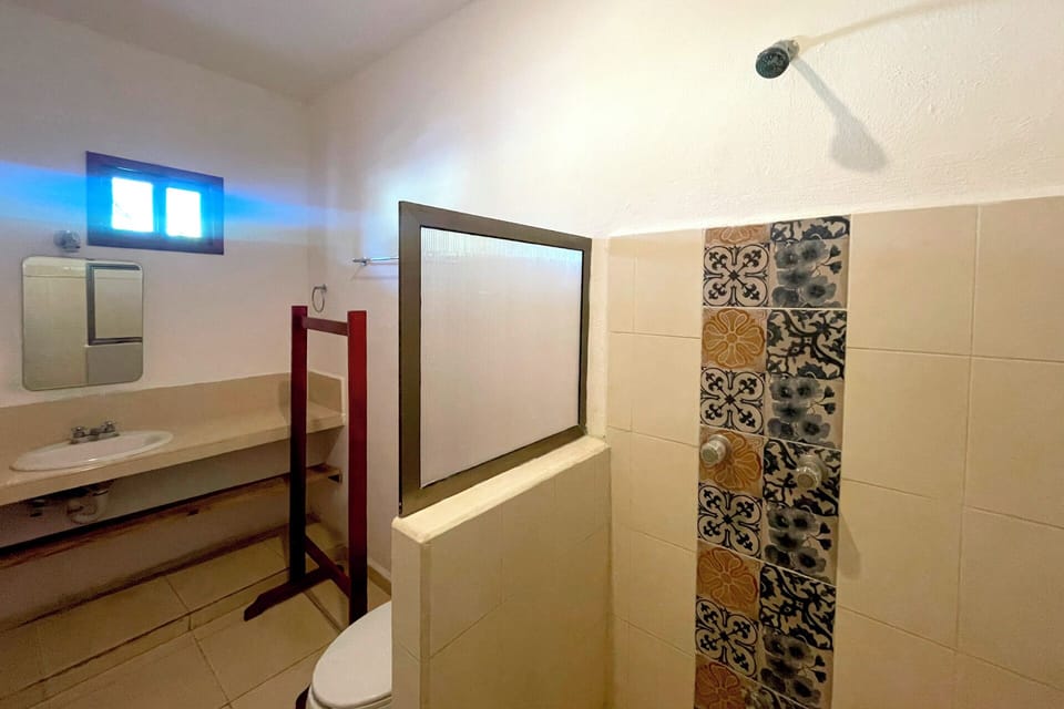 Double Room, 2 Double Beds | Bathroom | Shower, towels, soap, shampoo