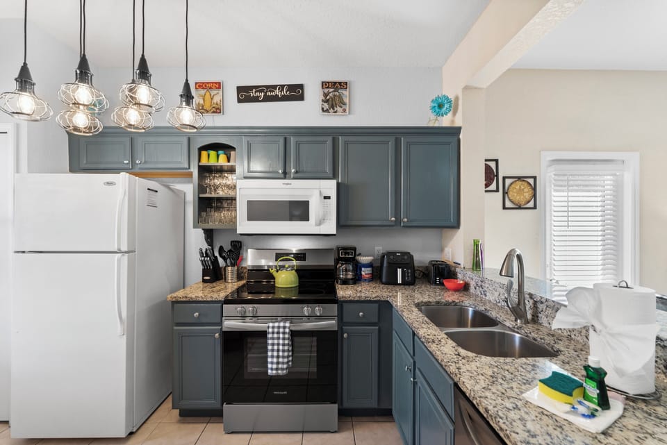 Updated kitchen with granite countertops and everything your family needs