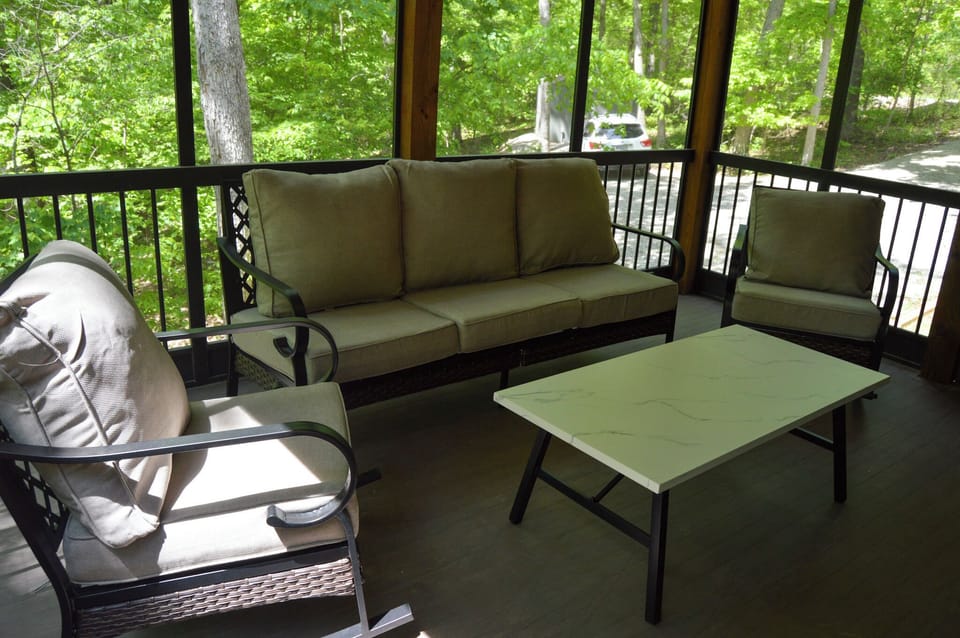 Perfect place to enjoy a morning cup of coffee. Outside but away from the bugs.