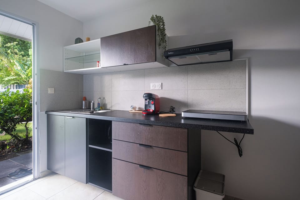 Comfort Apartment, Pool View | Private kitchen | Highchair, dining tables
