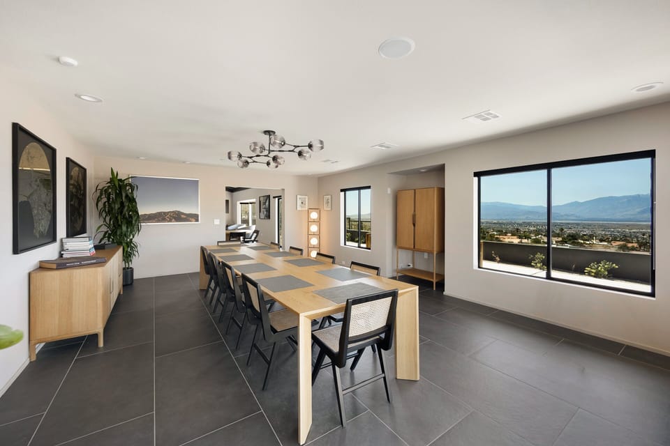 Light-filled dining area with a modern aesthetic.
