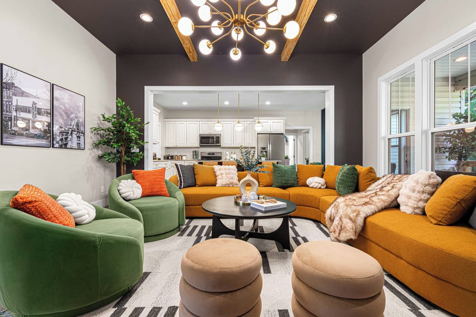 Gather in style in this stunning living room with a bold mix of colors