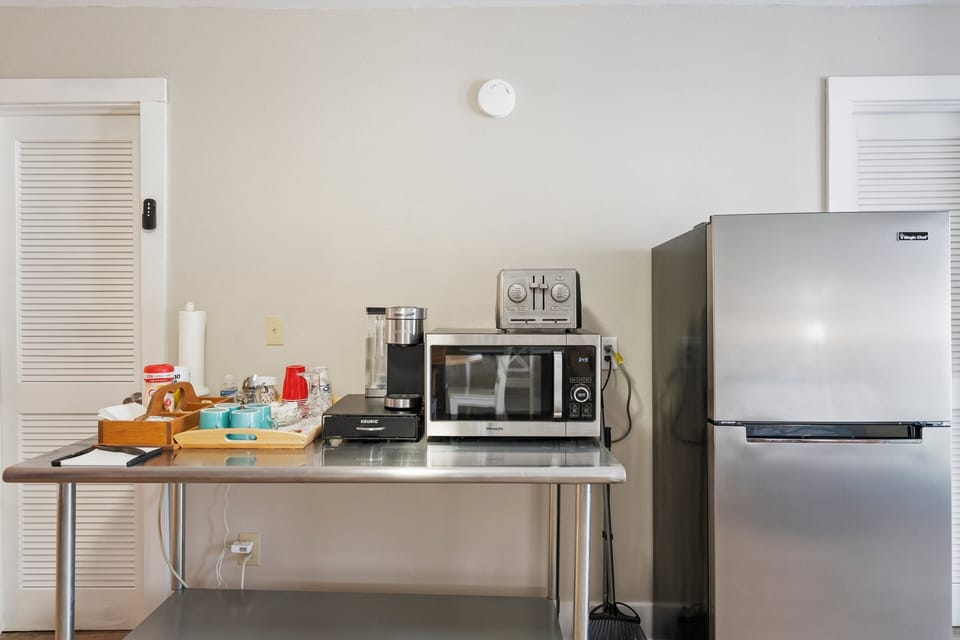 Suite, Multiple Beds | Laptop workspace, iron/ironing board (on request), WiFi (free)