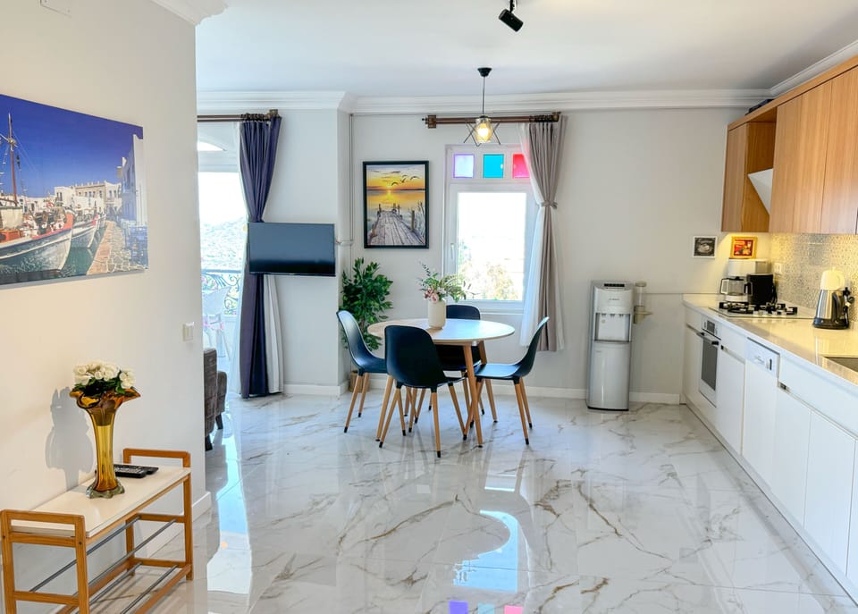 Apartment, Balcony, Sea View | Living area | Flat-screen TV