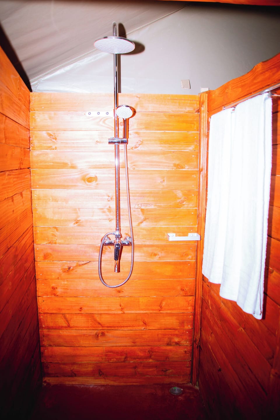 Shower, slippers, towels, soap