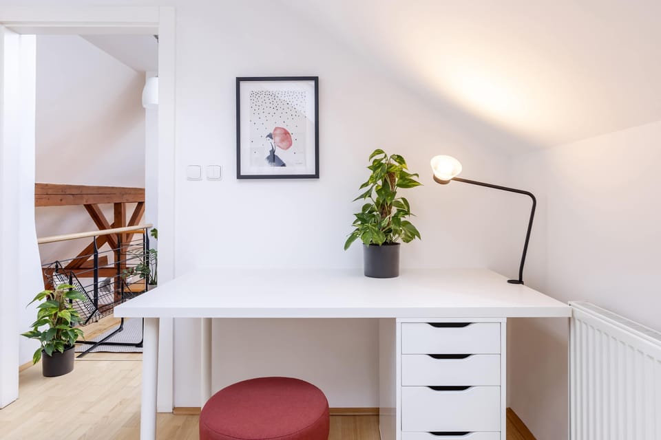 There is a working desk in this bedroom