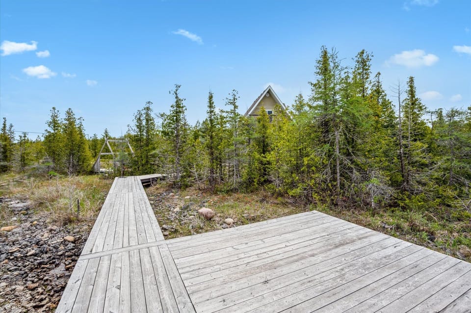 Enjoy dockside tranquility on this spacious landing at the edge of a calm channel leading into Dorcas Bay.