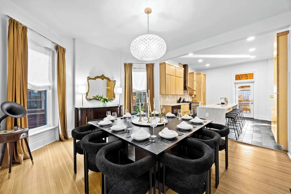 Dining Area: Host unforgettable dinners in this elegant dining room, seamlessly connected to a gourmet kitchen.