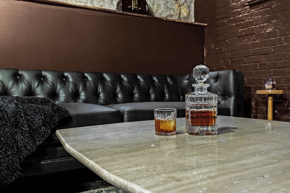 Bar: Mix up your favorite drinks at this unique and stylish bar area, perfect for evening relaxation. (Alcohol shown for display only and is not for guest consumption.)