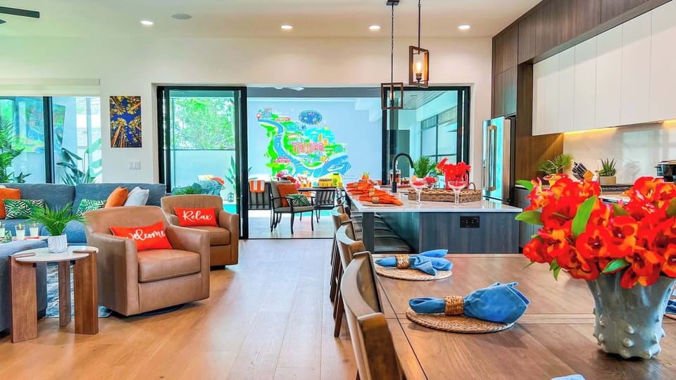 The dining area, kitchen, and living room all connect so no one is left out