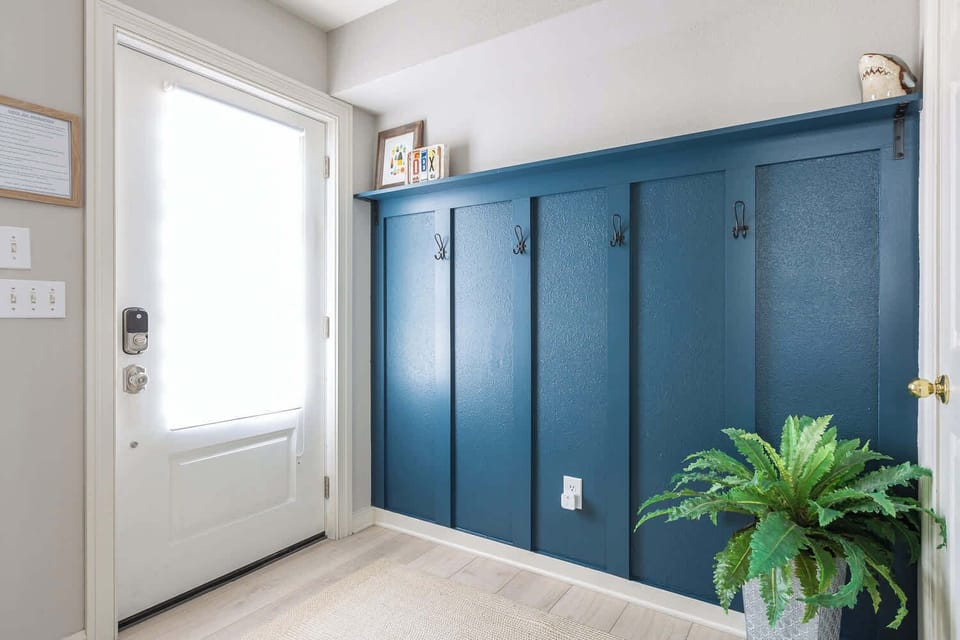 Main foyer featuring a built-in coat rack, gear hooks and smart lock access