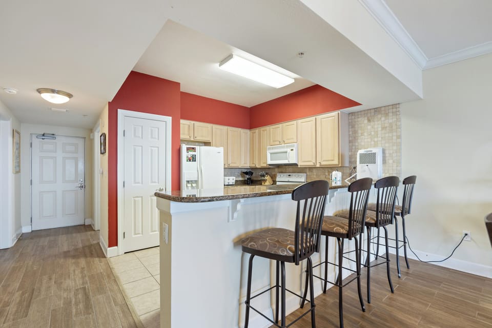 Waterway Stay - Unit 309 at Harbour Pointe - Modern kitchen with breakfast bar!