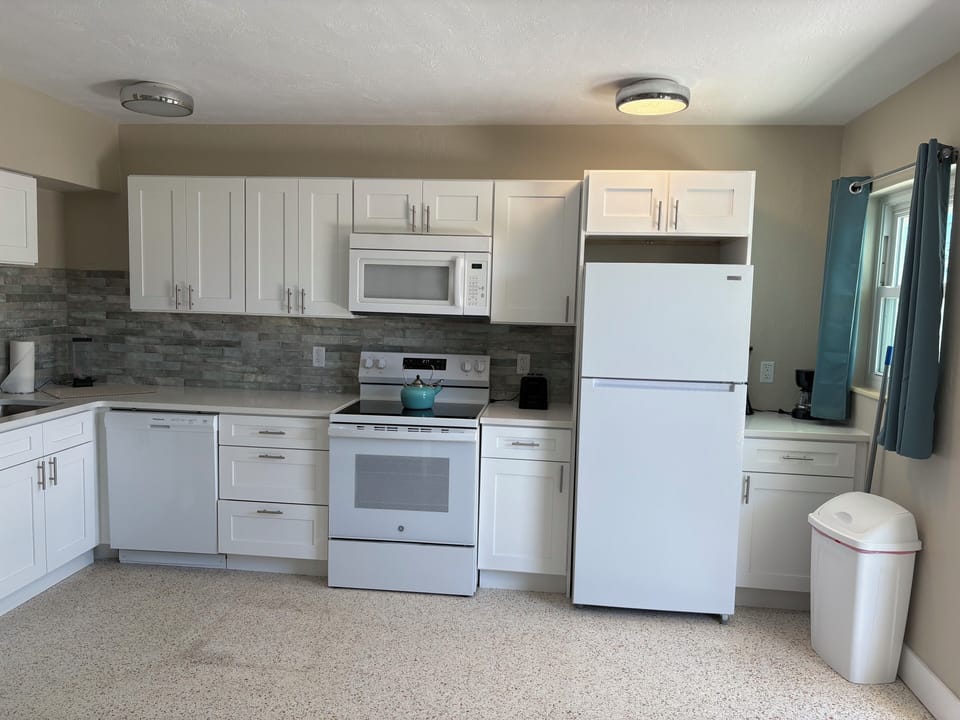 Full kitchen stocked with all booking, baking and eating essentials 