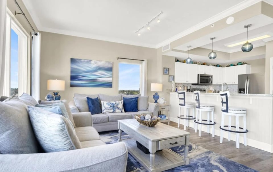 Bright living area with sofa sleeper, and Smart TV