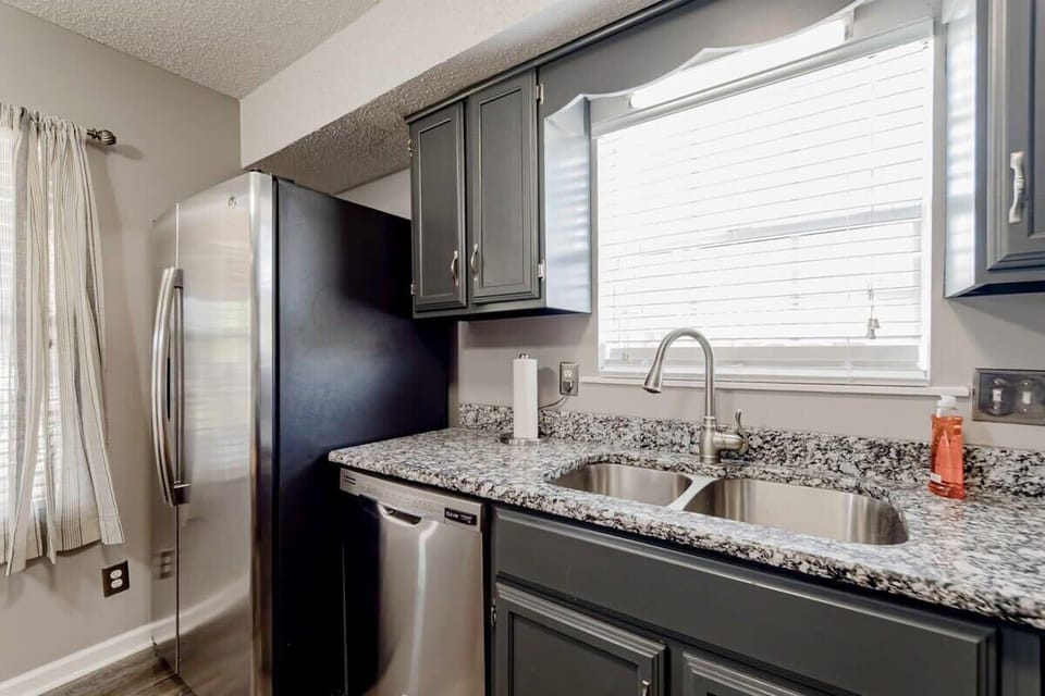 Marble Countertop with high-end fridge and sink