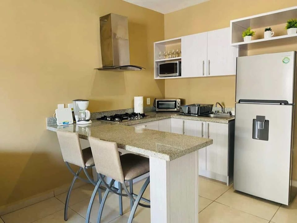 The breakfast bar can also serve as a laptop-friendly workspace