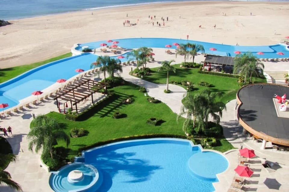 Enjoy spending the day lounging around the pools
