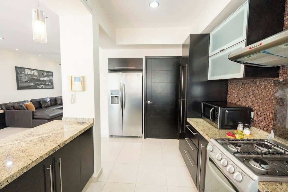 The kitchen has beautiful granite countertops