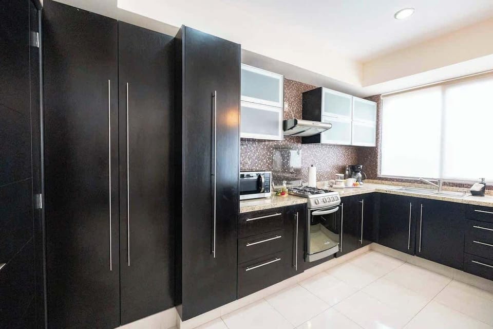 The kitchen has lots of natural light