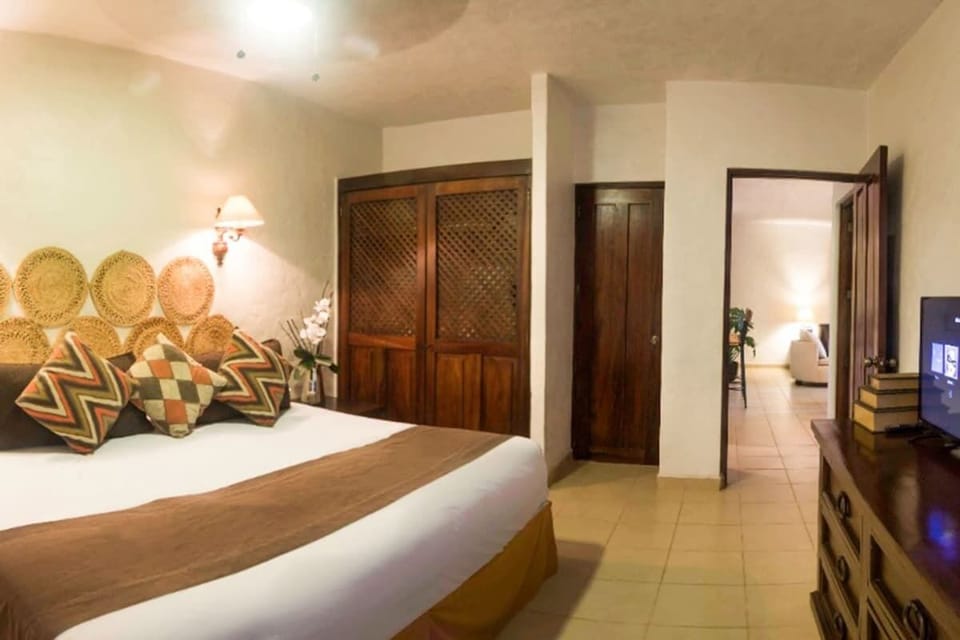 The master bedroom has a wonderful king bed