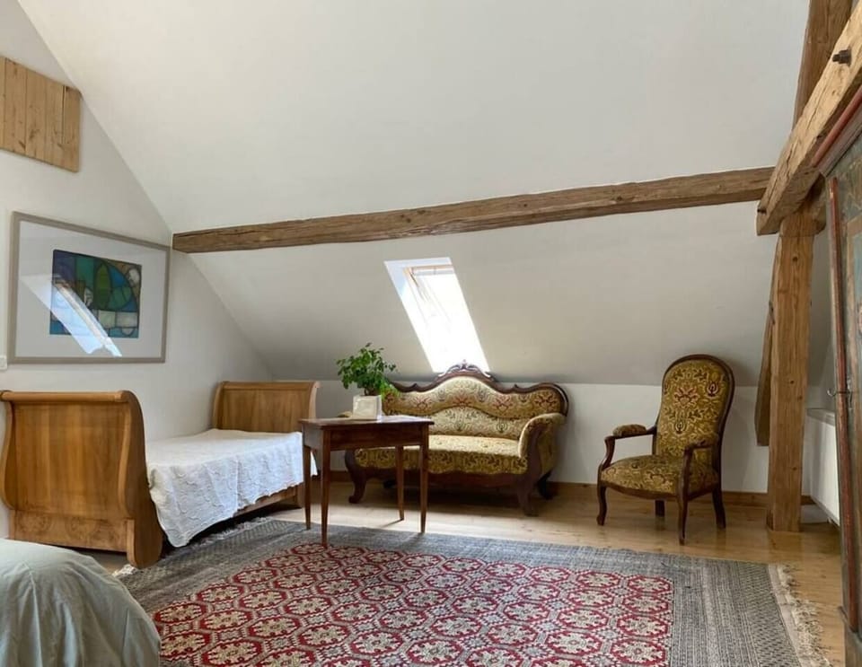 Upstairs living room and child's bed