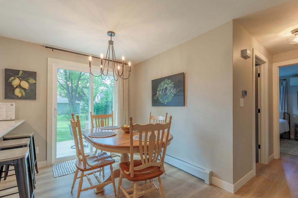 Bright dining area adjacent to the kitchen, featuring easy access to the patio through sliding doors—perfect for meals, entertaining, and indoor-outdoor living.