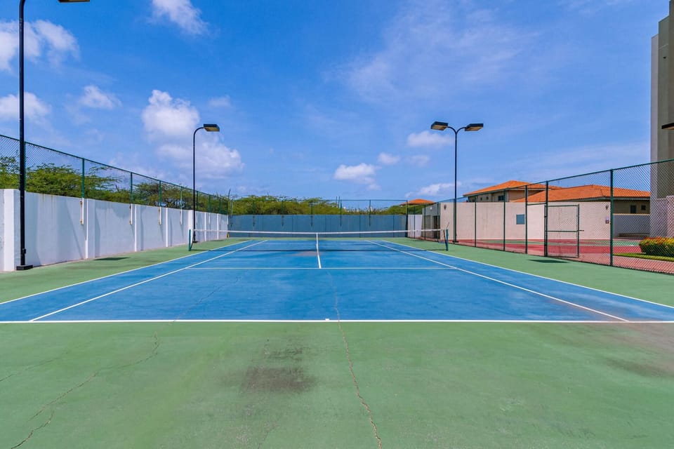 Enjoy an active stay with access to the shared tennis court, perfect for a friendly match or a casual game while soaking up the sun.