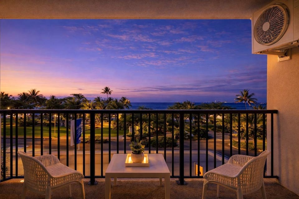 Private balcony with ocean views – enjoy sunset drinks overlooking palm trees and the sea