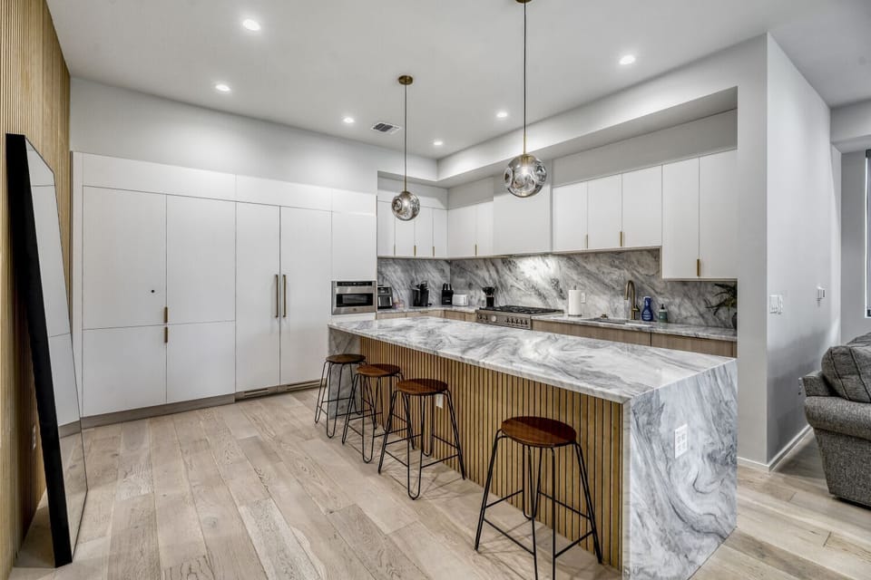 With ample counter space and quality appliances, cooking here is a pleasure.