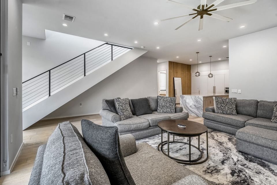 Bright and airy living space with modern furnishings and plenty of natural light.