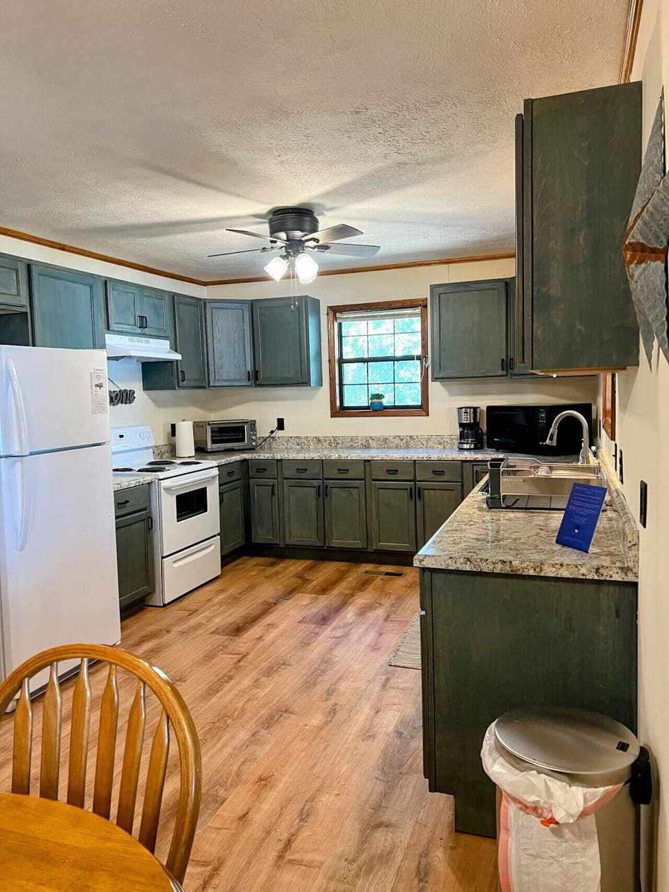 Large open well stocked kitchen with views overlooking Weiss Lake