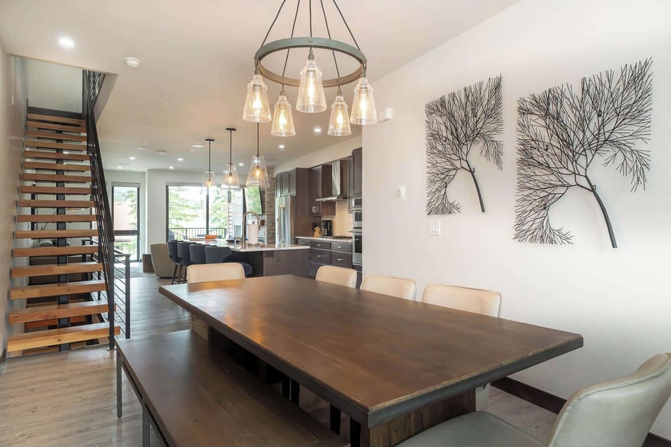 Dining Area: Gather around the elegant table, bathed in natural light and stylish decor!