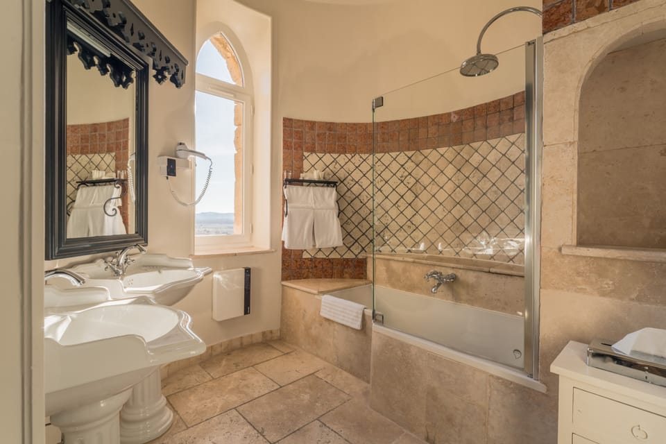 Junior Suite, 1 Queen Bed with Sofa bed | Bathroom | Shower, hair dryer, bathrobes, slippers