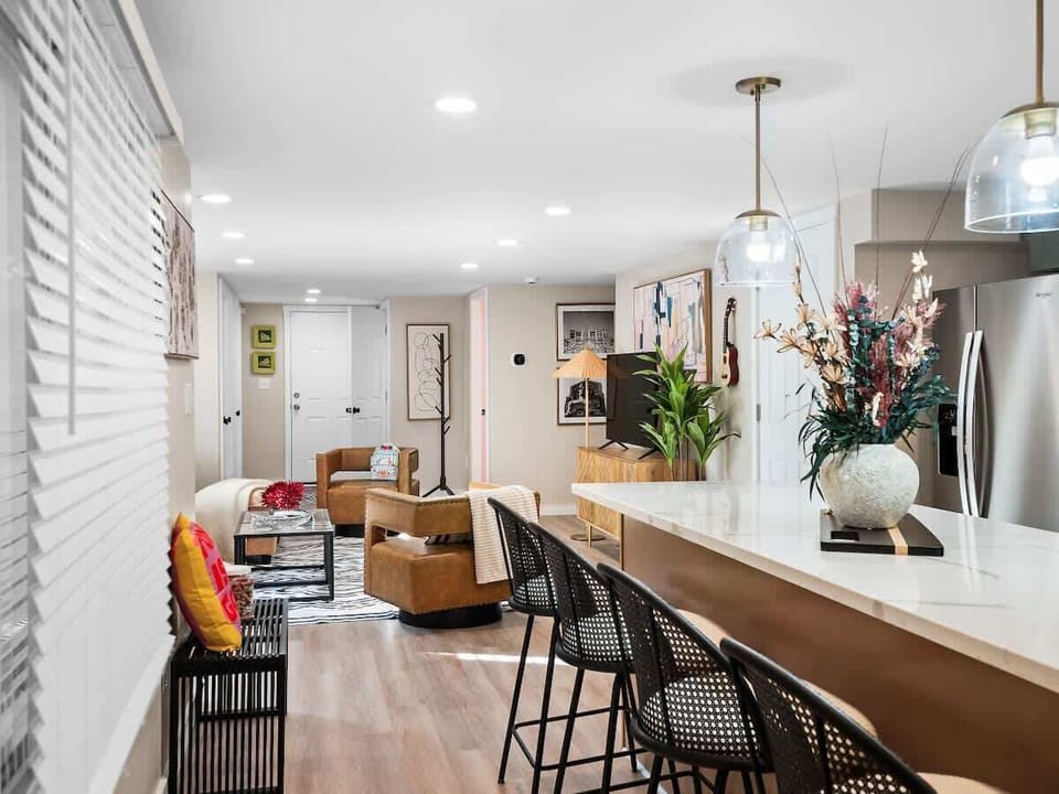 Open layout from kitchen island to living room, perfect for easy conversation.