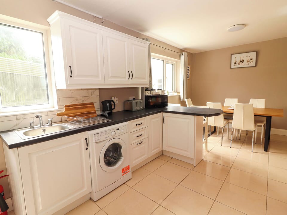 Fridge, microwave, toaster, cookware/dishes/utensils