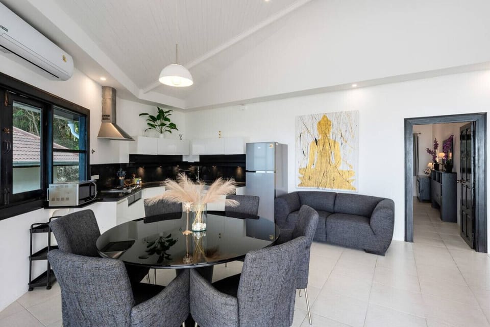 Cozy living room with modern sofa and warm decor at Villa SKY, Nathon Koh Samui