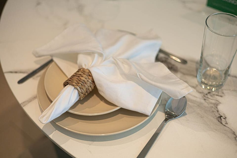 A neatly arranged dining setup, perfect for enjoying meals in style.