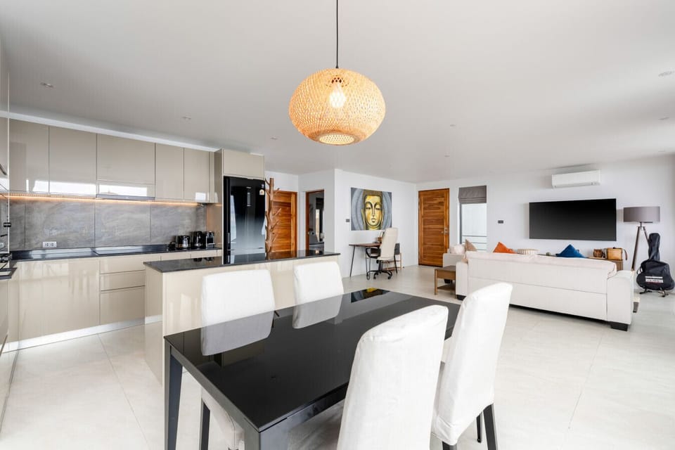Bright and breezy – the open-plan living room offers direct sea views and space to chill in style.