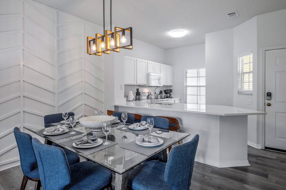 Dining area with kitchen in the back