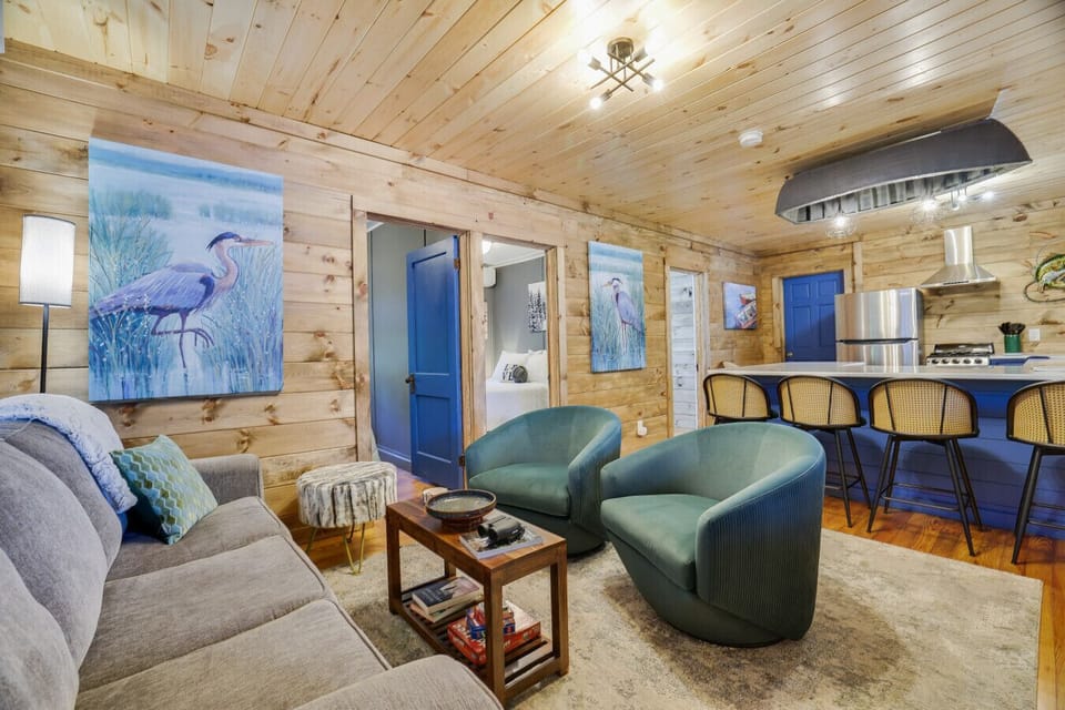 Unwind in this inviting living area where rustic elegance meets lakeside serenity!