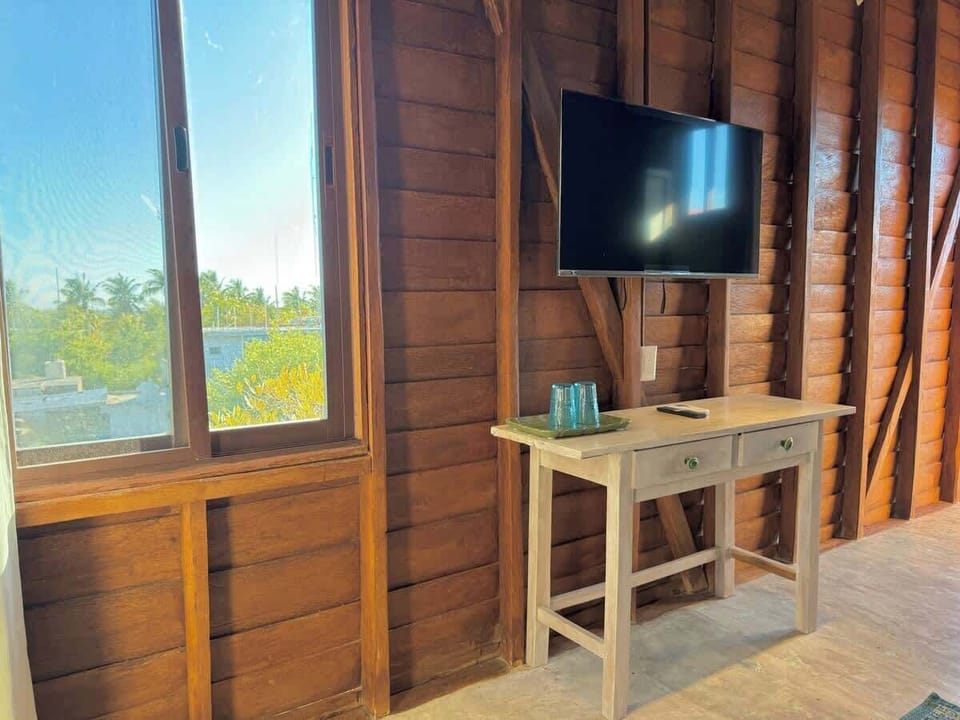 Room with TV and console