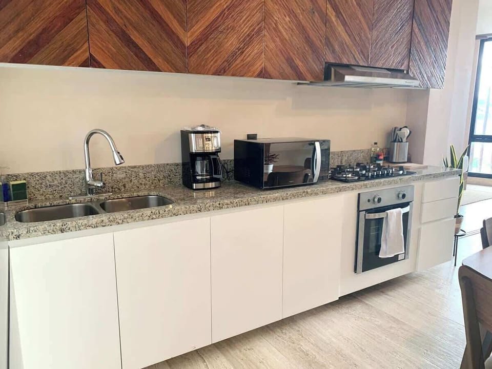 Fully equipped kitchen with double-height design
