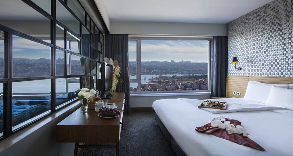 Suite, Bosphorus View | Minibar, in-room safe, desk, blackout drapes