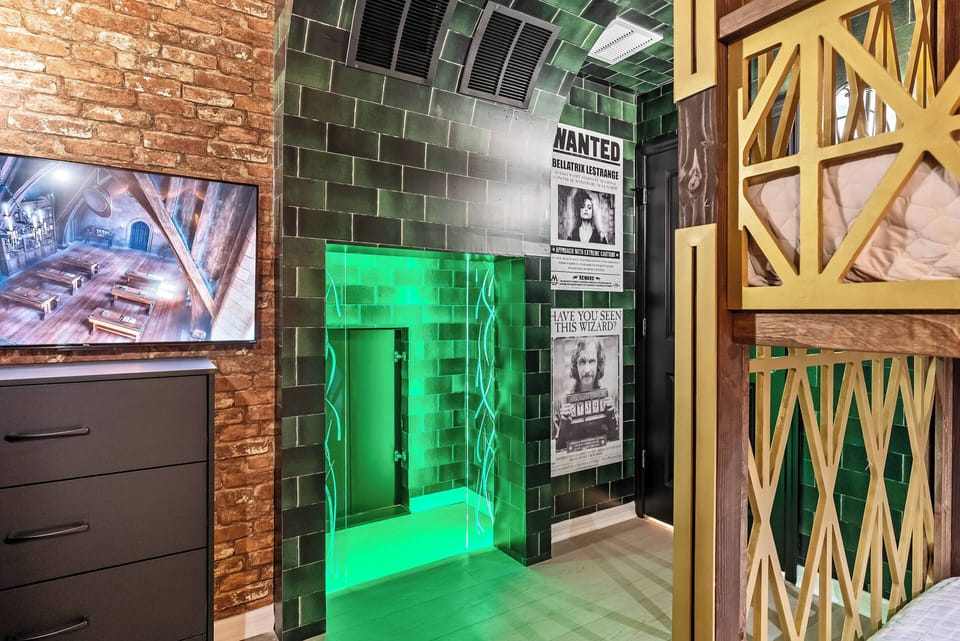 Discover a uniquely designed space with textured brick walls and vibrant green lighting that creates a bold atmosphere. Enjoy vintage decor and framed artwork, making it the ideal spot to relax and savor your experience.