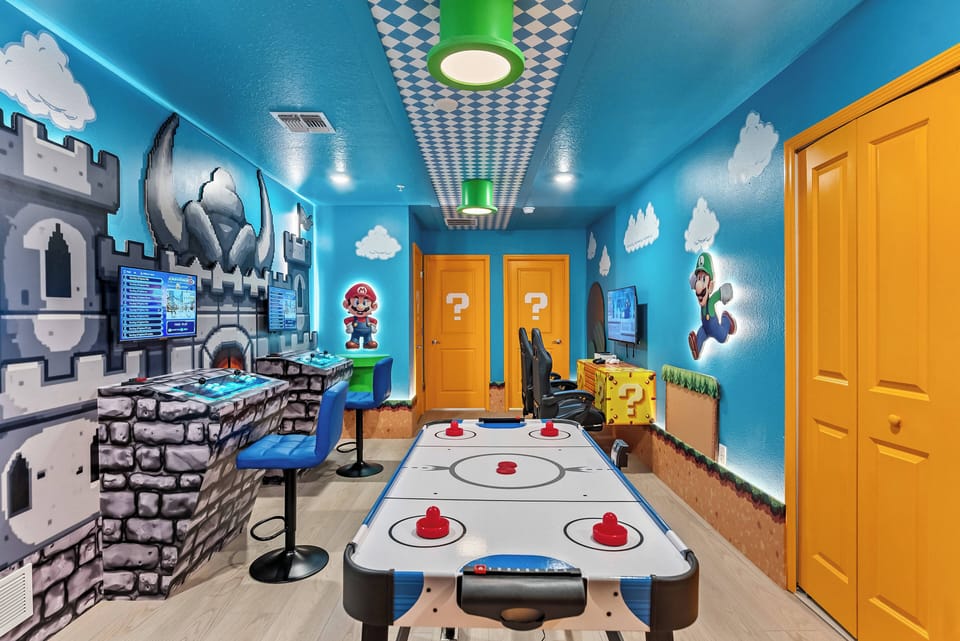 Enter a lively game room with nostalgic murals and bright blue walls, paired with fresh yellow doors. Enjoy friendly competition at the air hockey table, all surrounded by colorful decor and sleek seating for a fun atmosphere.