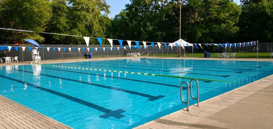 Complimentary access to a nearby outdoor pool included with your stay.