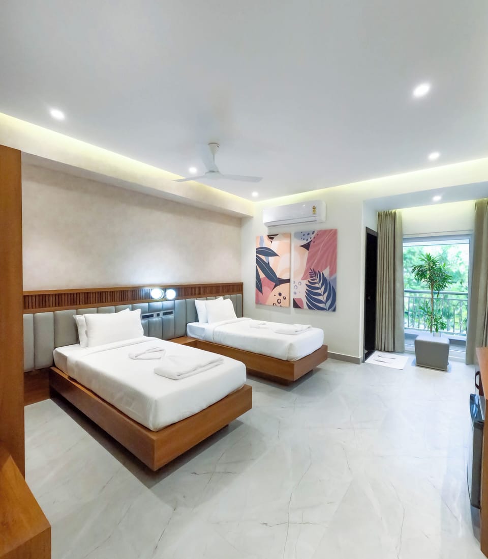 Deluxe Double or Twin Room, Balcony, City View | Desk, laptop workspace, soundproofing, free WiFi
