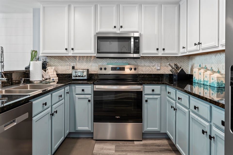 Full kitchen with stainless steel appliances